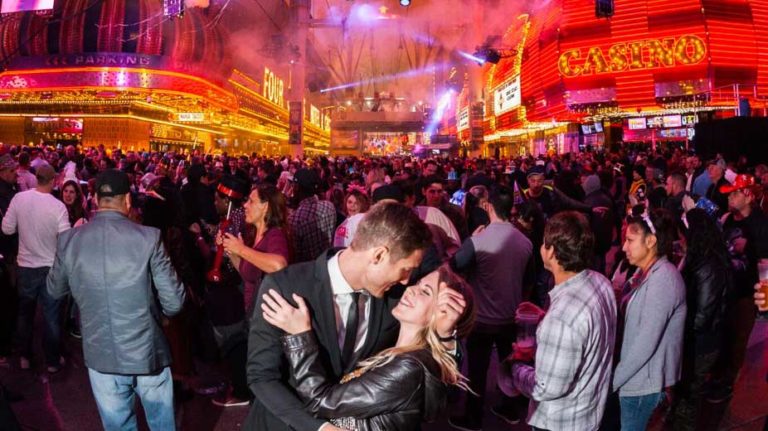 The Ultimate Date Night Challenge in Downtown Las Vegas 1 New Years on Fremont Street Couple Kissing