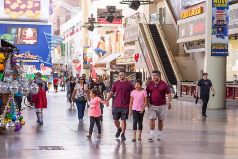 20 Family Things To Do in Vegas 1 family walking down fremont street experience