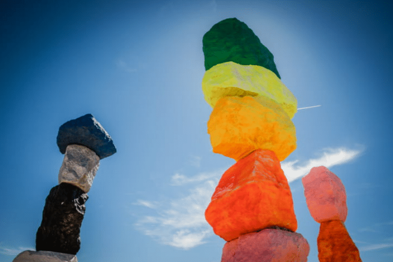 Top 13 Hidden Las Vegas Gems 3 Colored rocks stacked upon one another which creates the Seven Magic Mountains in Las Vegas, Nevada. It is an art installation by Ugo Rondinone.