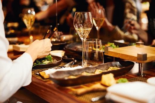 Eight Best Restaurants Off The Las Vegas Strip 1 Focus is on food at a table in a restaurant off the Las Vegas Strip.